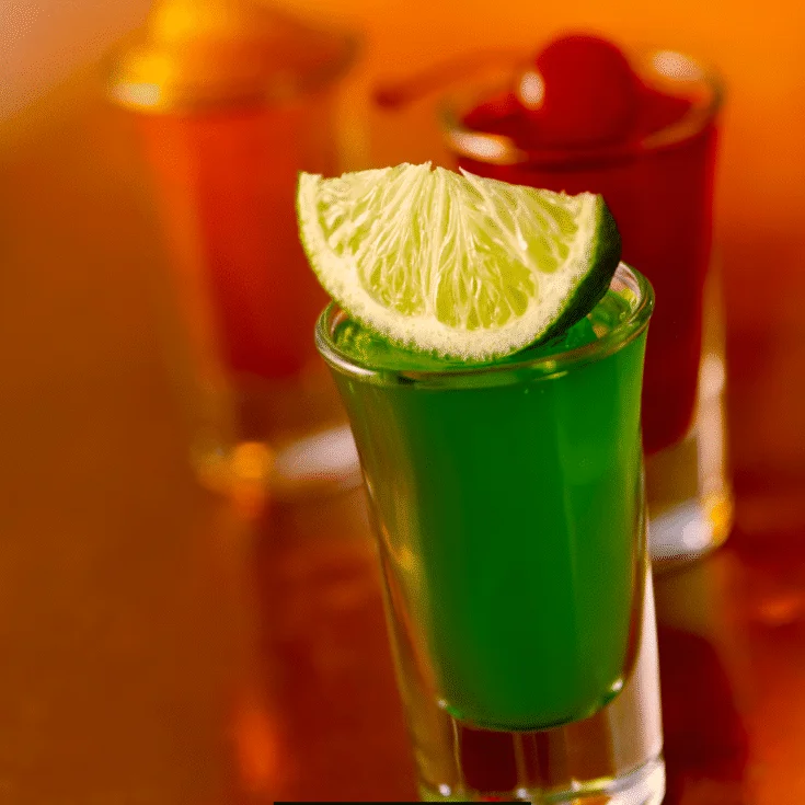 Jello Shots with Vodka topped with a slice of lemon
