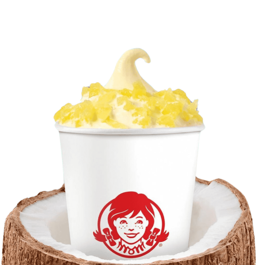 Wendy's Pineapple Frosty with pineapple toppings served on a coconut
