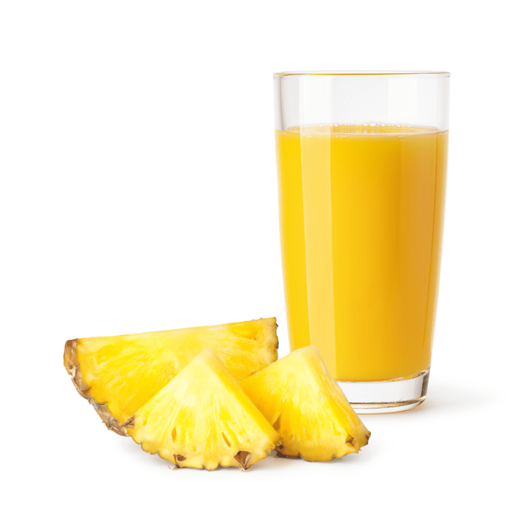 Homemade pineapple juice with pineapple slices
